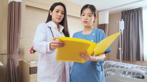 Portrait of smiling doctors standing together on the ward