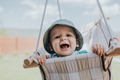 Happy kid enjoying outdoors in summertime. - PhotoDune Item for Sale
