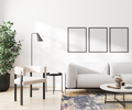 three blank frames mock up in home living room interior with white sofa, 3d rendering - PhotoDune Item for Sale