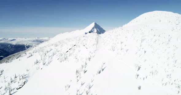 Snow capped mountain during winter 4k