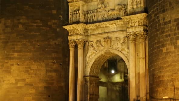 Evening panorama of triumphal arch of New Castle in Naples, Italy, tourism