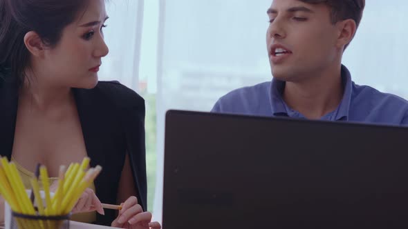 Creative Business People Group Having Conversation at Office Desk in Workplace