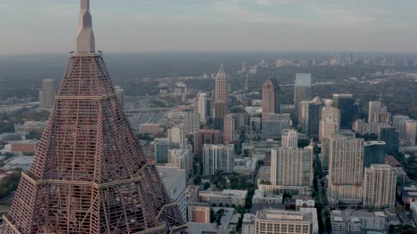 Sunset in Atlanta of Midtown near the Bank of America tower with drone rising while facing north