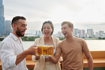 rinking beer at rooftop bar restaurant