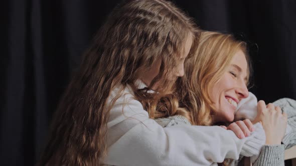 Happy Mom and Daughter Fooling Around