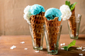 Turquoise ice cream in waffle cones - PhotoDune Item for Sale