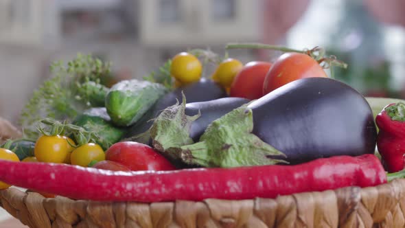 Basket Of Vegetables Is On the Table In Kitchen