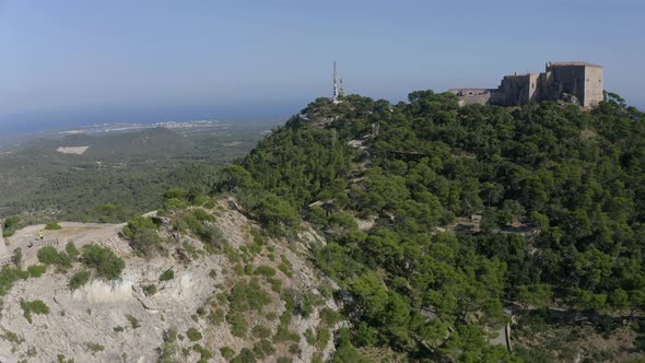 Mountain cross and Santuari de Sant Salvador monastery, Mallorca