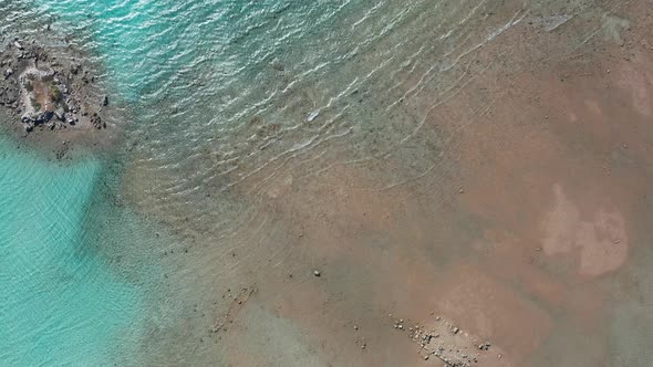 Aerial View of Clear Turquoise Water Near a Tropical Island in the Caribbean