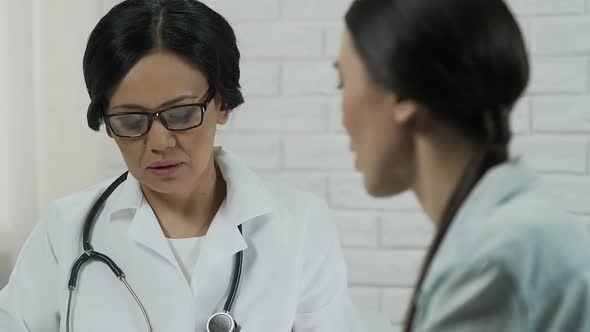 Unhappy Woman Complaining About Disease to Gynecologist, Incurable Illness