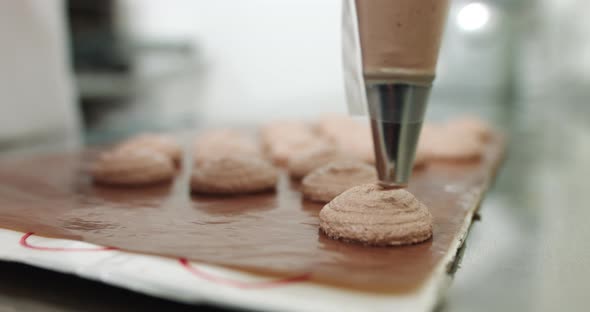 Chef Making Base for Preparation Macaron Dessert