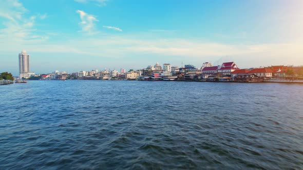 4K : Aerial view over Bangkok city and Chao phraya river. Cinematic drone shot.