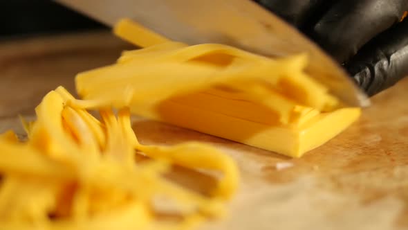 Slicing Cheese (slowmotion)