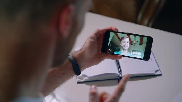 Man Making Talk Online Video Calling with Smartphone at Home Spbas