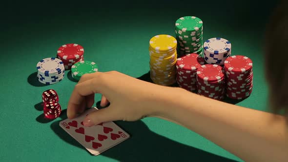 Happy Winner Showing Poker Hand With Pride, Taking Bank in Risky Card Game
