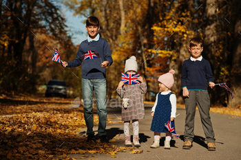  british flags in autumn park.  Britishness celebrating UK.