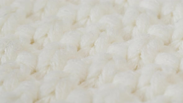 White Knitted Cloth Light Woolen Clothes Fabric Closeup Woven Textile Background