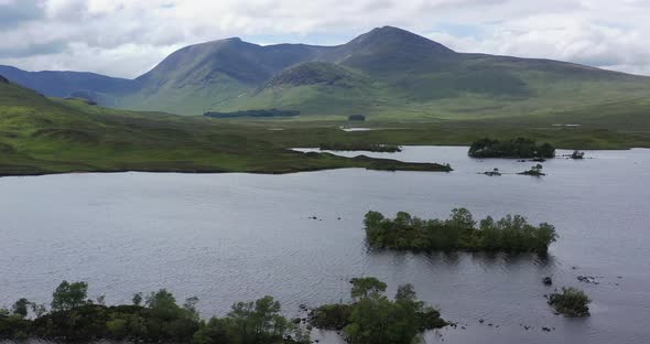 Highland loch and munros, Lochan na h-Achlaise, Rannoch Moor, Highlands, Scotland, aerial