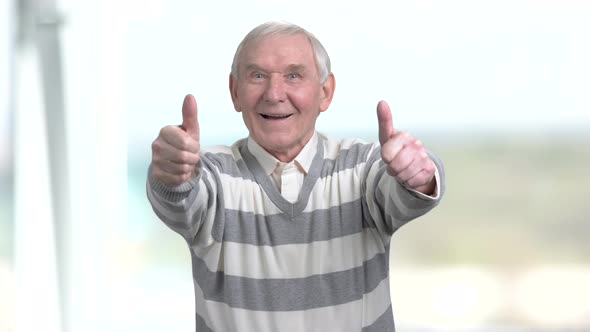 Elderly Man Giving Thumbs Up.