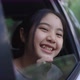 Cinematic Pretty Asian Girl In Car, Leans Out Passenger Side Car Window - VideoHive Item for Sale