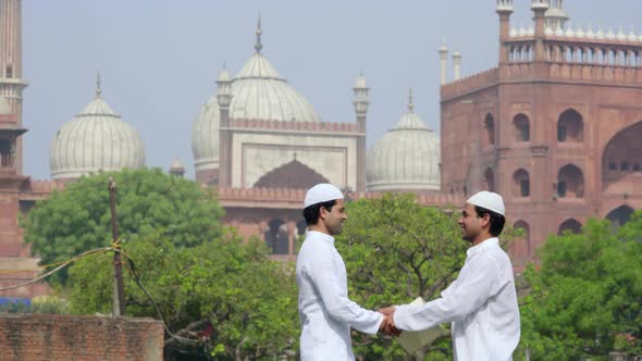 Indian men celebrating Eid