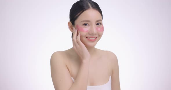 Cosmetic Eye Mask. Close Up Beauty Face Asian Woman With Fresh Clean Skin Using Eye Pad.
