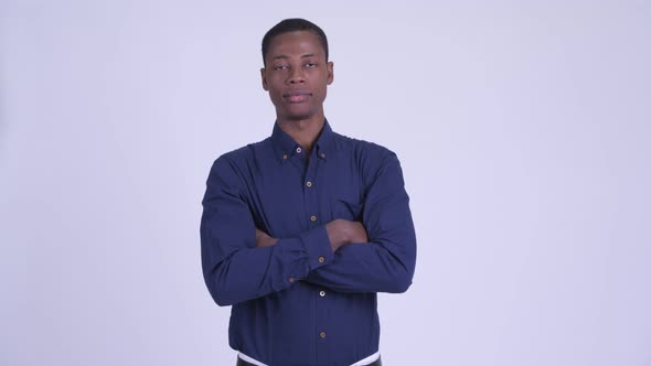 Young Handsome African Businessman with Arms Crossed