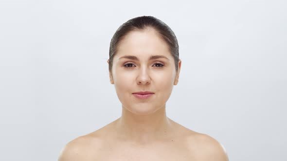 Studio portrait of young, beautiful and natural blond woman