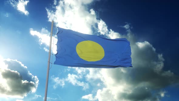 Republic of Palau Flag Waving at Wind Against Beautiful Blue Sky