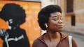 Side view of attractive Afro American woman in glasses looking h - PhotoDune Item for Sale