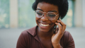 Pretty dark-skinned female in glasses having conversation with f - PhotoDune Item for Sale