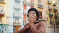 Excited African girl looking amazed emotionally covering face with hands looking around in the city - PhotoDune Item for Sale