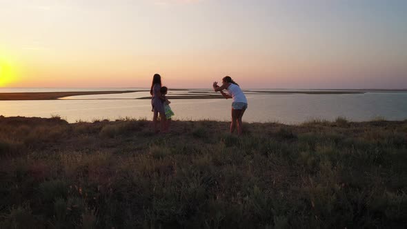 Evening Photo Session on the Background of the Lake