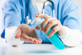 Doctor using hand sanitizer gel - PhotoDune Item for Sale