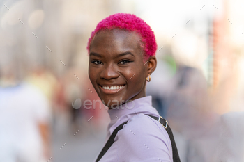 Modern stylish afro woman smiling to the camera