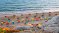Sunbeds and umbrellas on the Falesia Beach - PhotoDune Item for Sale