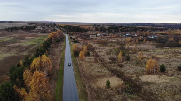 10 Road Between Fields And Autumn Trees