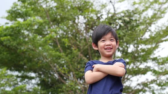 Close Up Of Happy Asian Child Outdoor Slow Motion 