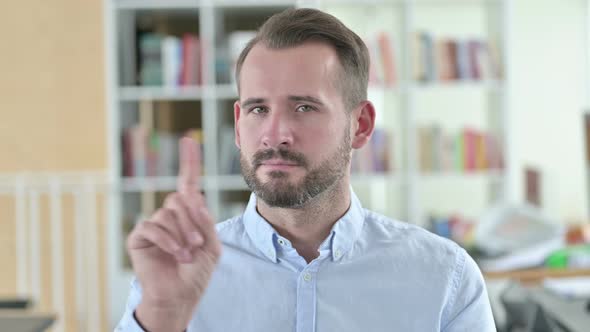 Portrait of Young Man Shaking Finger, No Sign 