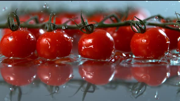Tomatoes Falling to Water in Super Slow Motion Shot with High Speed Cinema Camera in   1000Fps