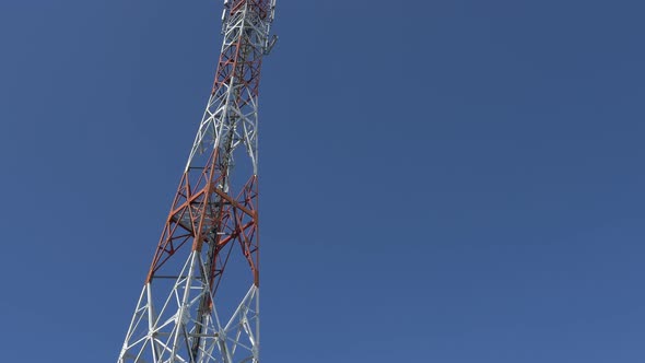 Telecommunication tower against blue sky 4K 2160p UHD video - Antenna system outdoor 4K 3840X2160 UH