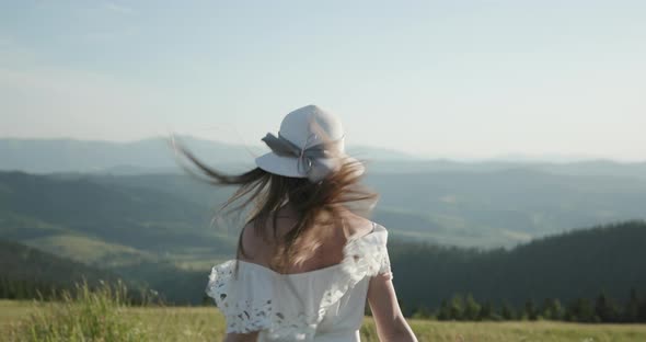 Girl is Having Fun on the Top of the World