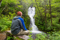 Hiker near waterfall - PhotoDune Item for Sale