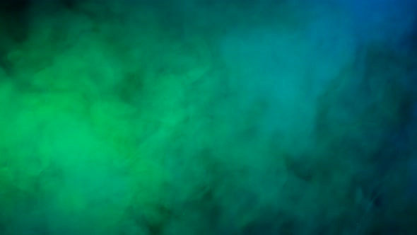 Abstract Green and Blue Smoke in Slow Motion