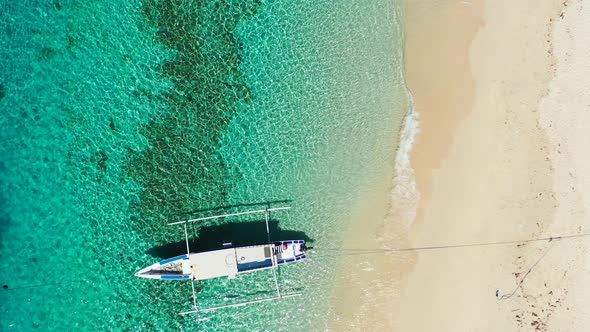 Daytime aerial abstract shot of a sunshine white sandy paradise beach and blue water background in h