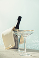 Bottle of champagne and glasses on sea and sky background. - PhotoDune Item for Sale