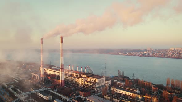 Industrial zone with factory pollution, smokestack exhaust gases