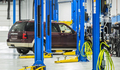 Car on an Automotive Lift During Scheduled Maintenance - PhotoDune Item for Sale