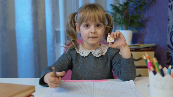 Child Girl Studying Homework During Online Lessons at Home Kid Making Video Call Distance Education