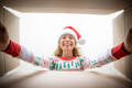 Surprised woman unpack Christmas gift box - PhotoDune Item for Sale